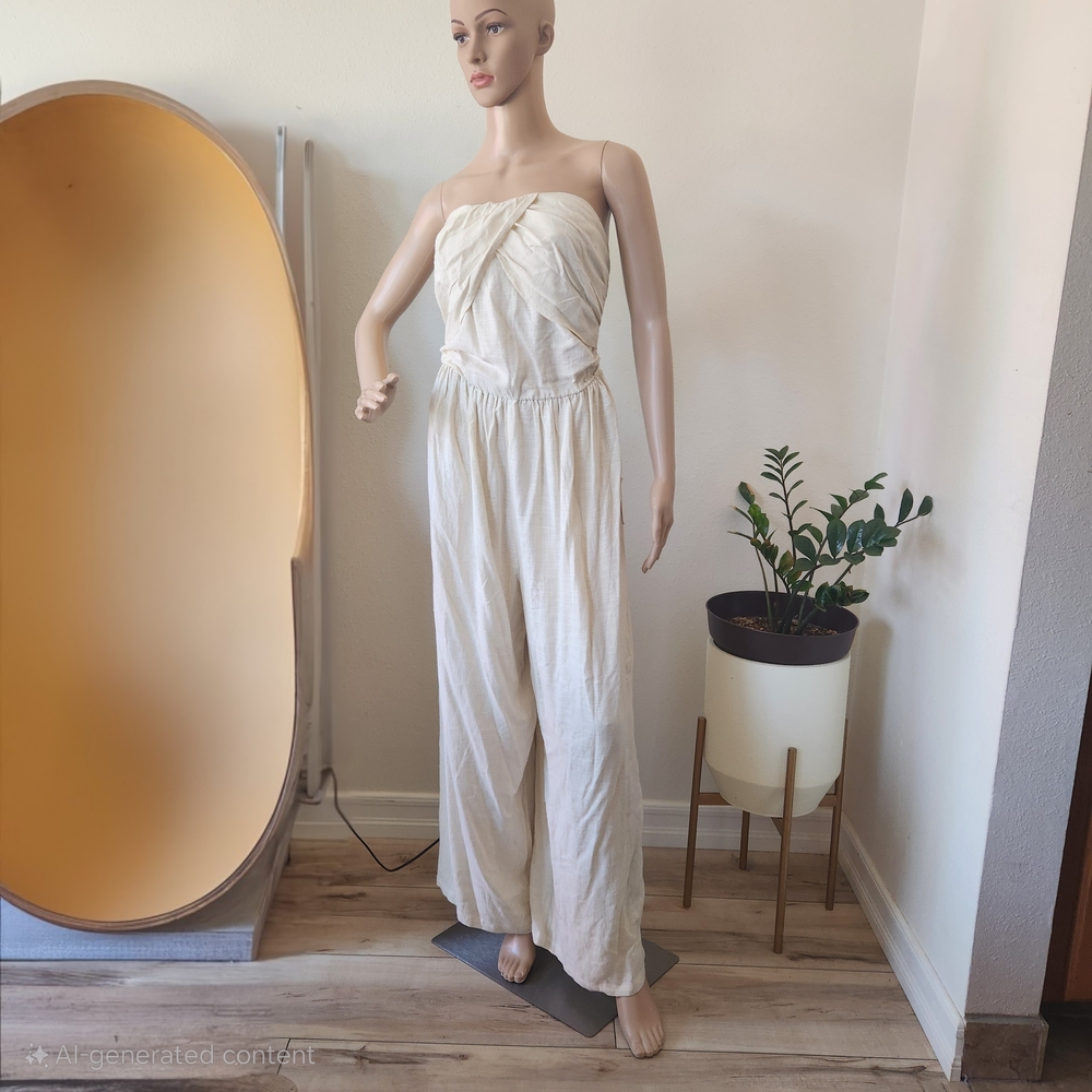 Cream Strapless Jumpsuit with Ruffled Overlay and Flowing Pants
